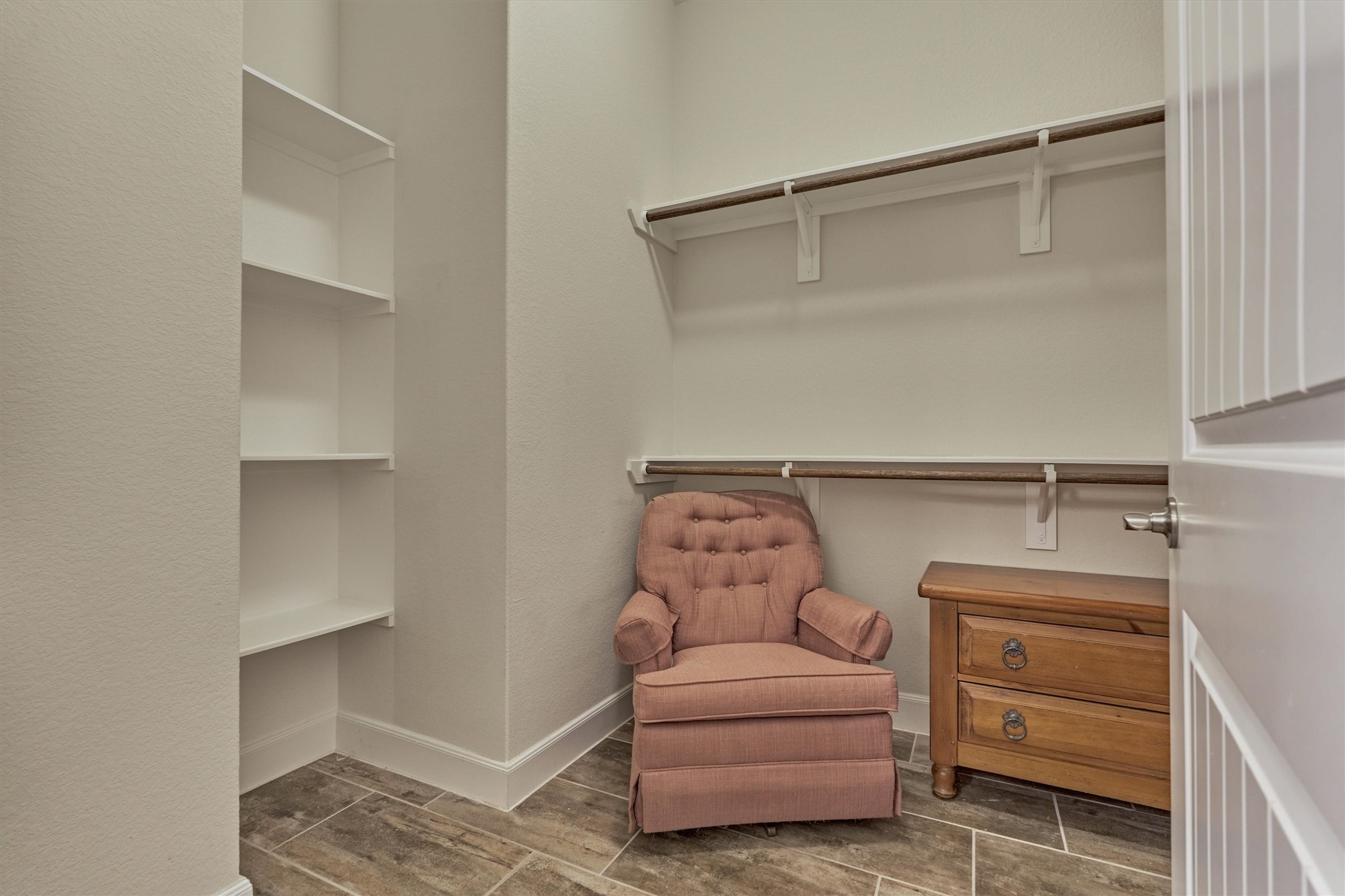 132 Chestnut Bay Spring, TX 77382 - Photo 28 of 33 a bedroom with a bed and a cabinets