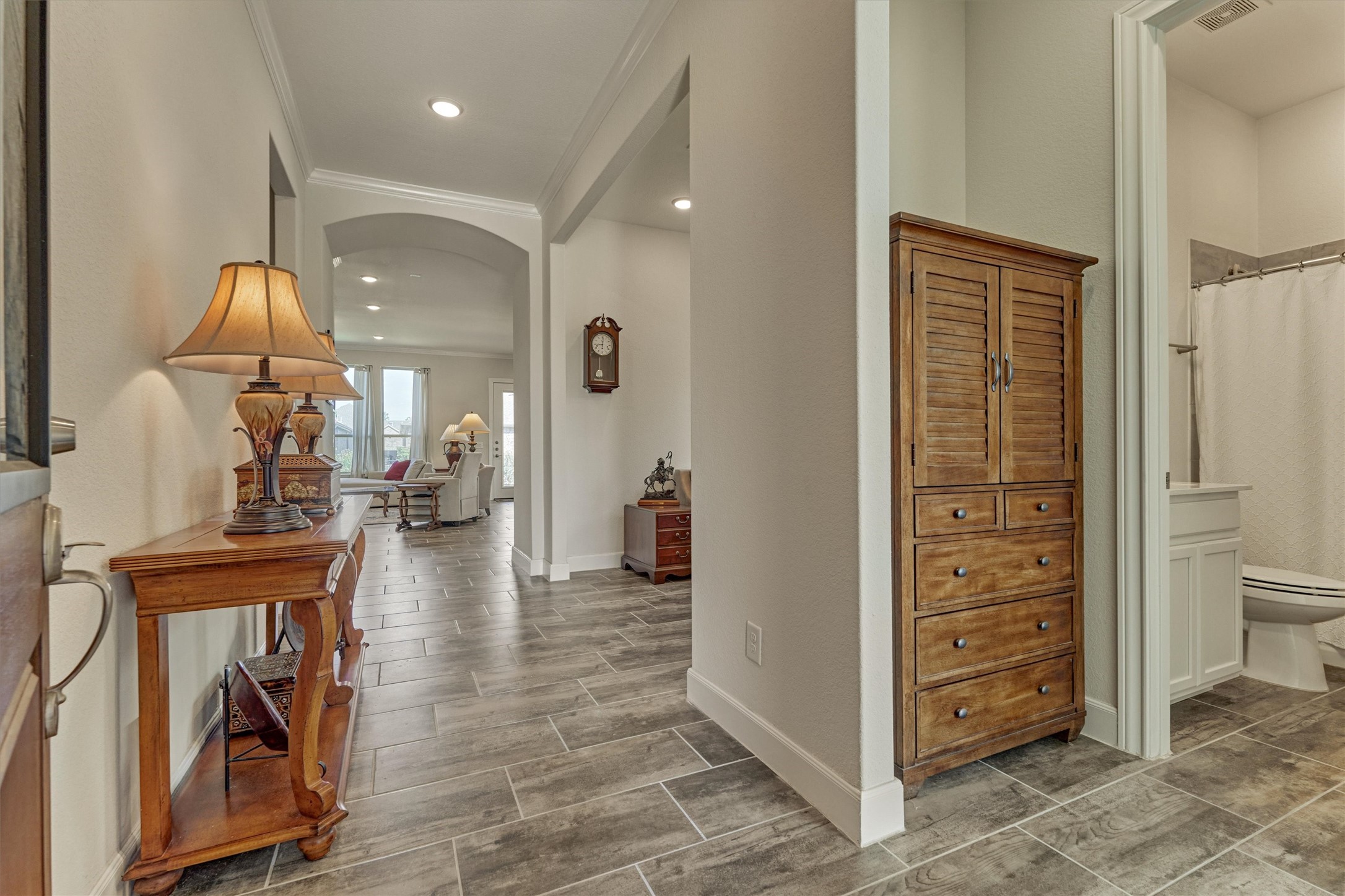 132 Chestnut Bay Spring, TX 77382 - Photo 4 of 33 a view of a hallway and a livingroom with furniture