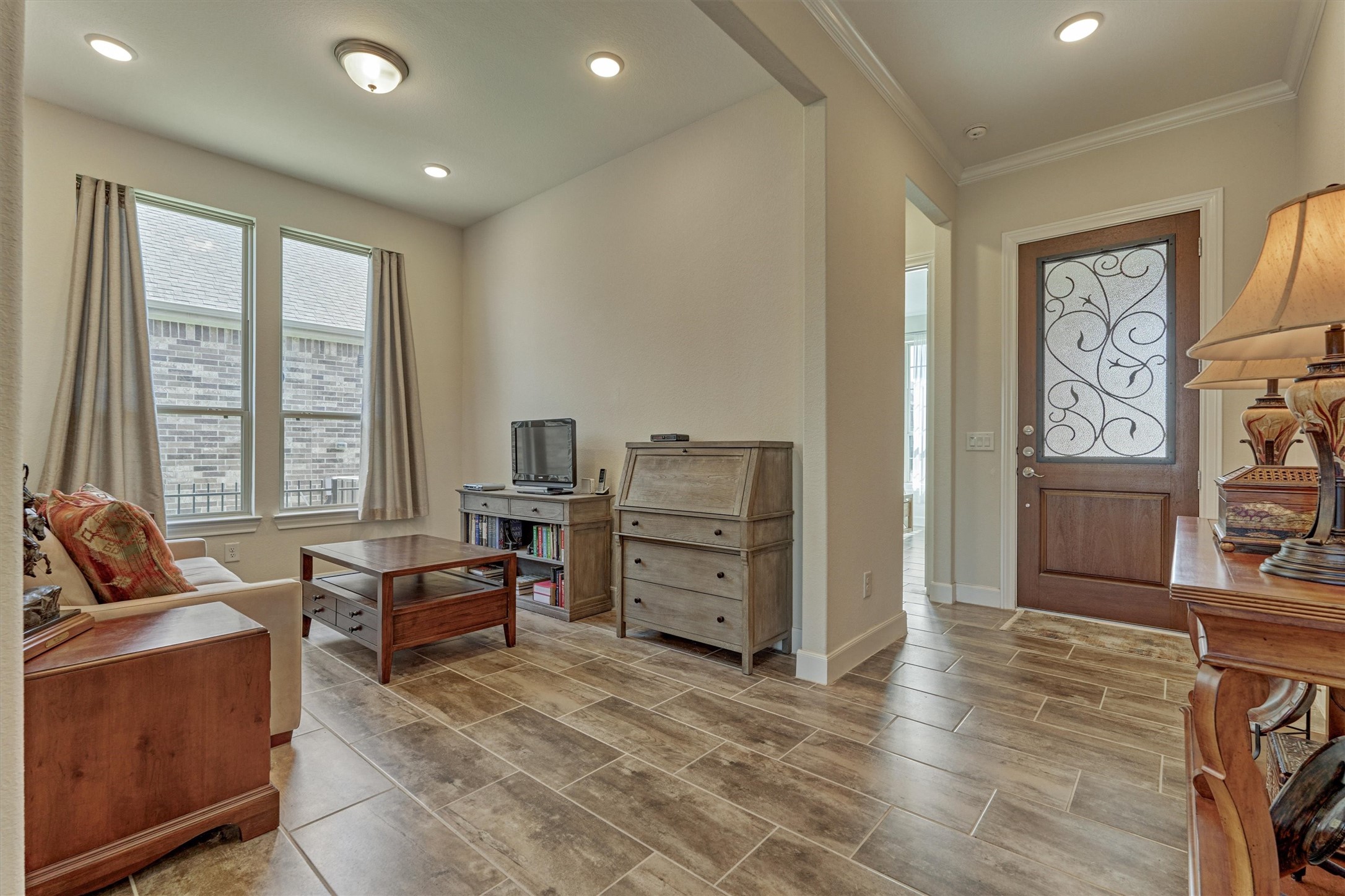 132 Chestnut Bay Spring, TX 77382 - Photo 9 of 33 a living room with furniture and large windows
