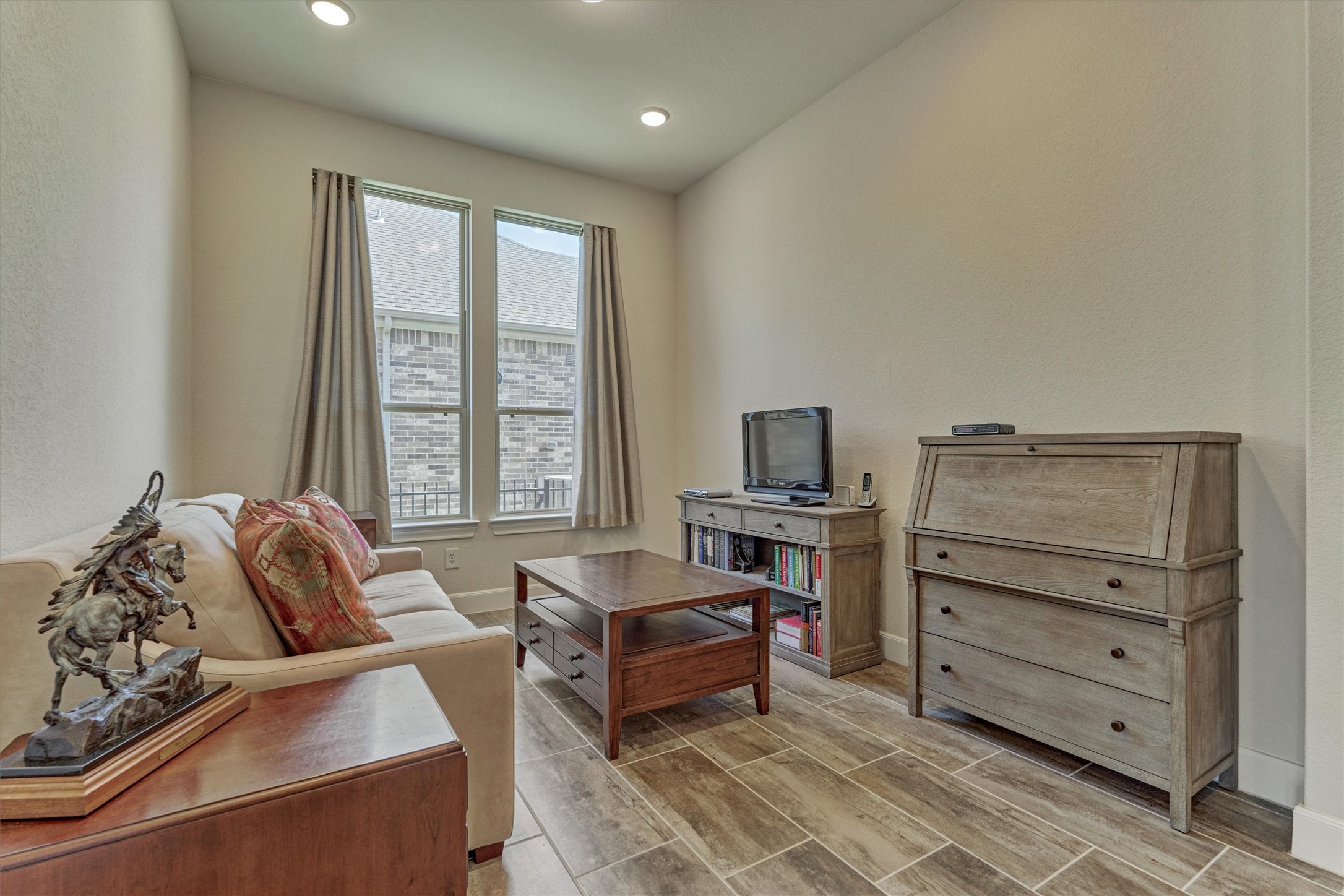 132 Chestnut Bay Spring, TX 77382 - Photo 10 of 33 a bedroom with furniture and a window