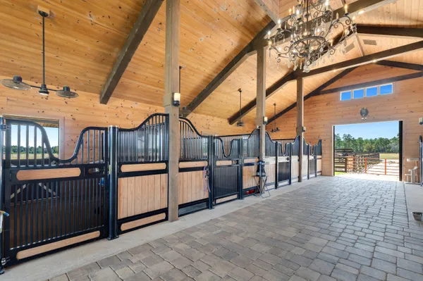 a view of a house with swimming pool yard and outdoor seating