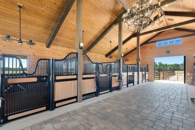 a view of a house with swimming pool yard and outdoor seating