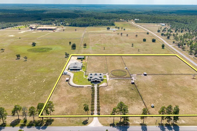 a view of a house with swimming pool