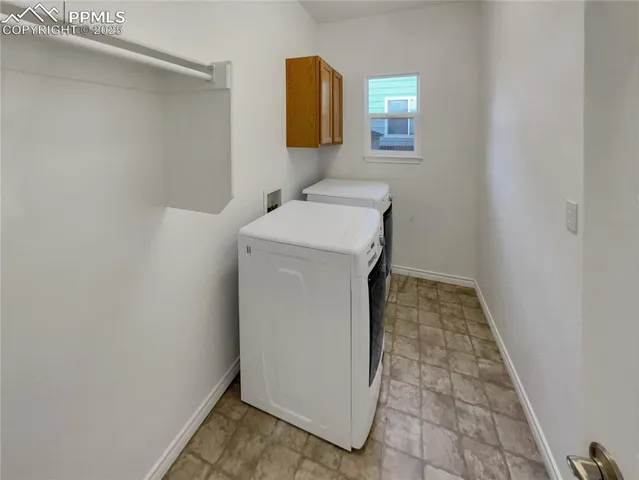 a utility room with a washer and dryer