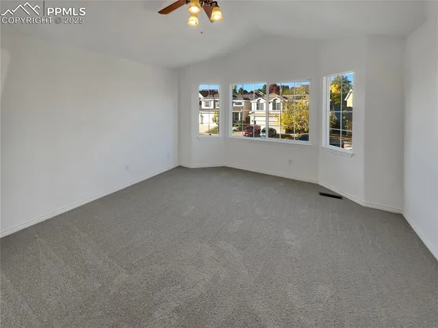 an empty room that has a window