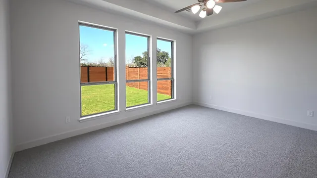 a workspace with furniture and a window