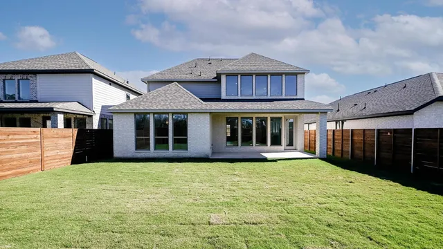 a view of swimming pool with furniture