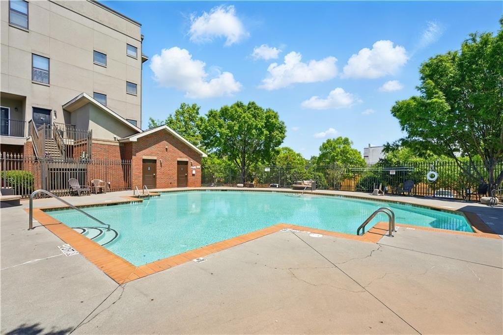 898 Oak Street Southwest, Unit 1214 Atlanta, GA 30310 - Photo 17 of 23 a view of swimming pool with a yard