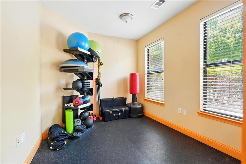 898 Oak Street Southwest, Unit 1214 Atlanta, GA 30310 - Photo 21 of 23 a children room with toys and a window