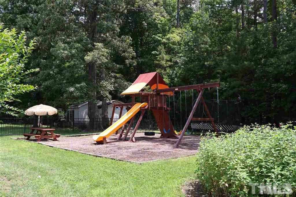 12928 Victory Church Road Raleigh, NC 27613 - Photo 8 of 25 a view of a park with slide