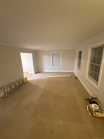 a view of hallway with stairs