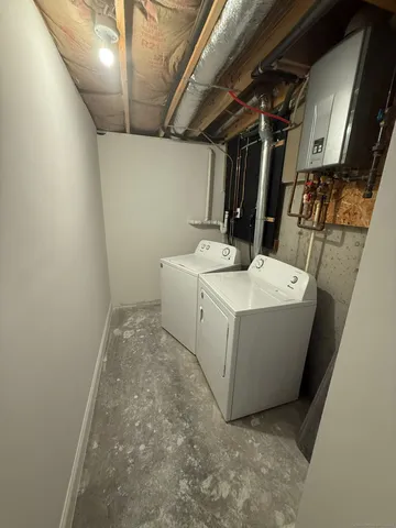 a bathroom with a bathtub and shower