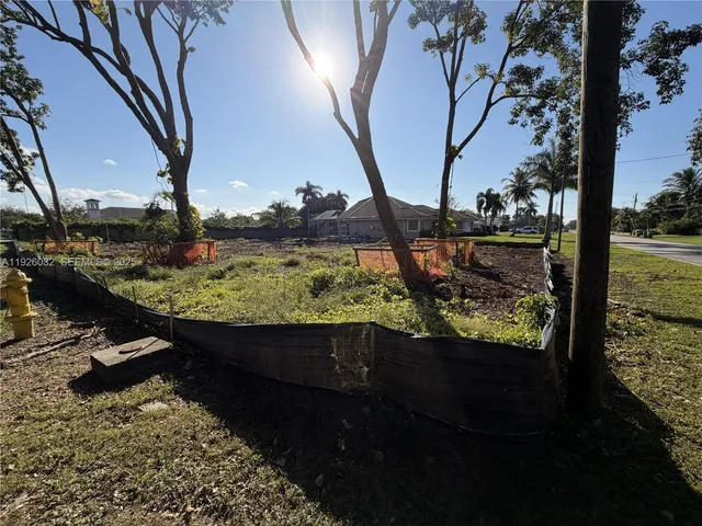 a view of swimming pool from a yard