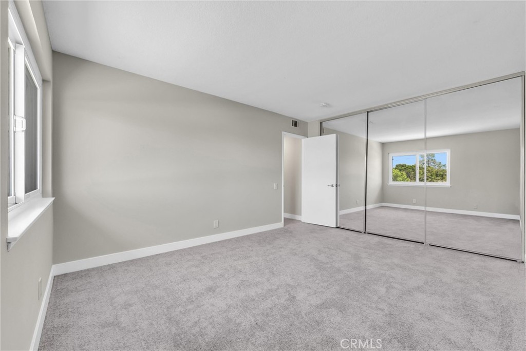 16040 Leffingwell Road, Unit 30 Whittier, CA 90603 - Photo 18 of 25 Large bedroom with a wall to wall closet