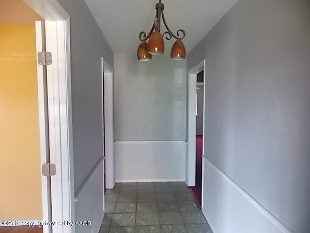 6001 Jameson Road Amarillo, TX 79106 - Photo 5 of 22 a view of a hallway view with staircase