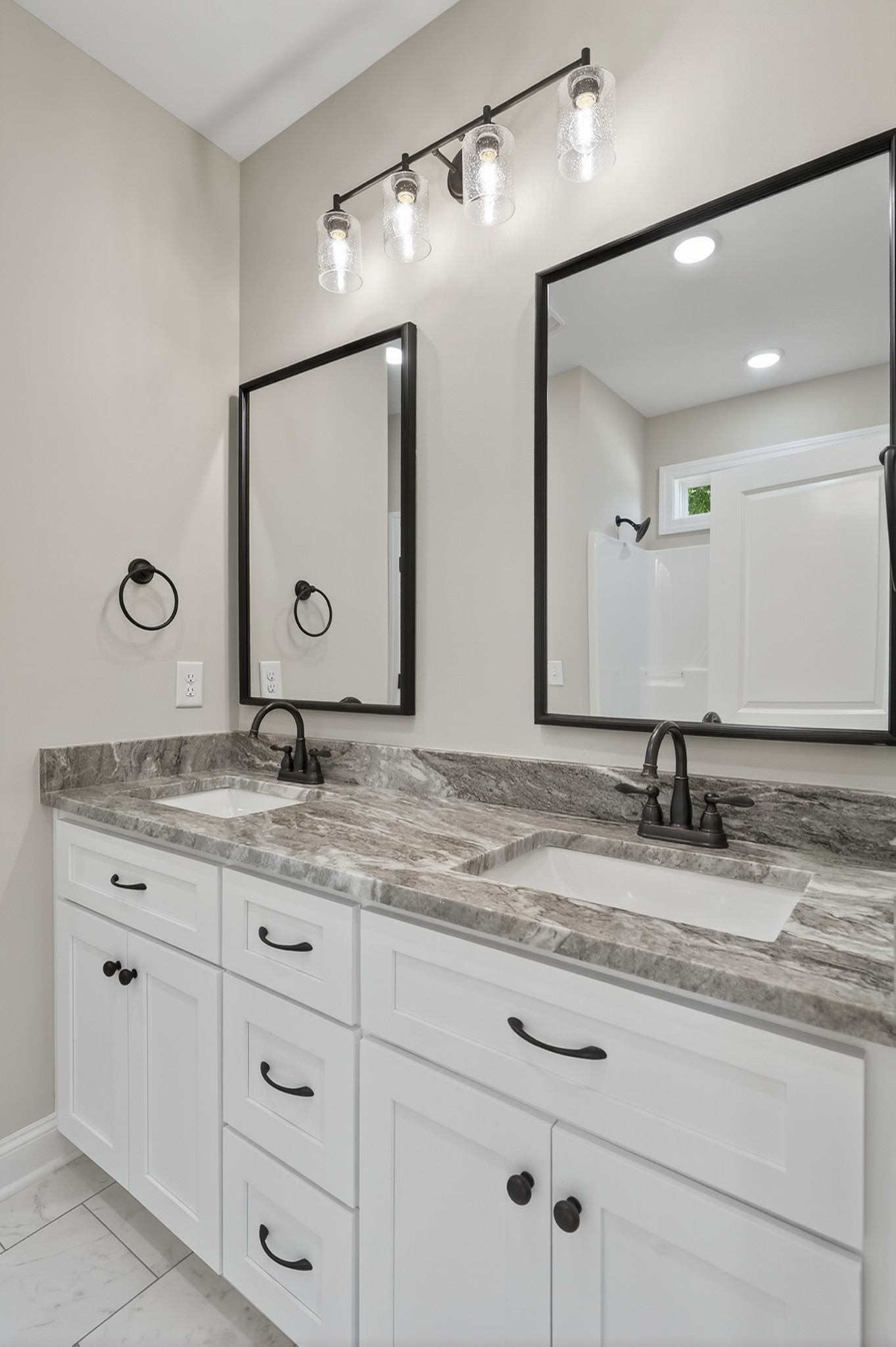 702 Meadow Road Mount Pleasant, TN 38474 - Photo 31 of 51 a bathroom with a granite countertop sink mirror and double