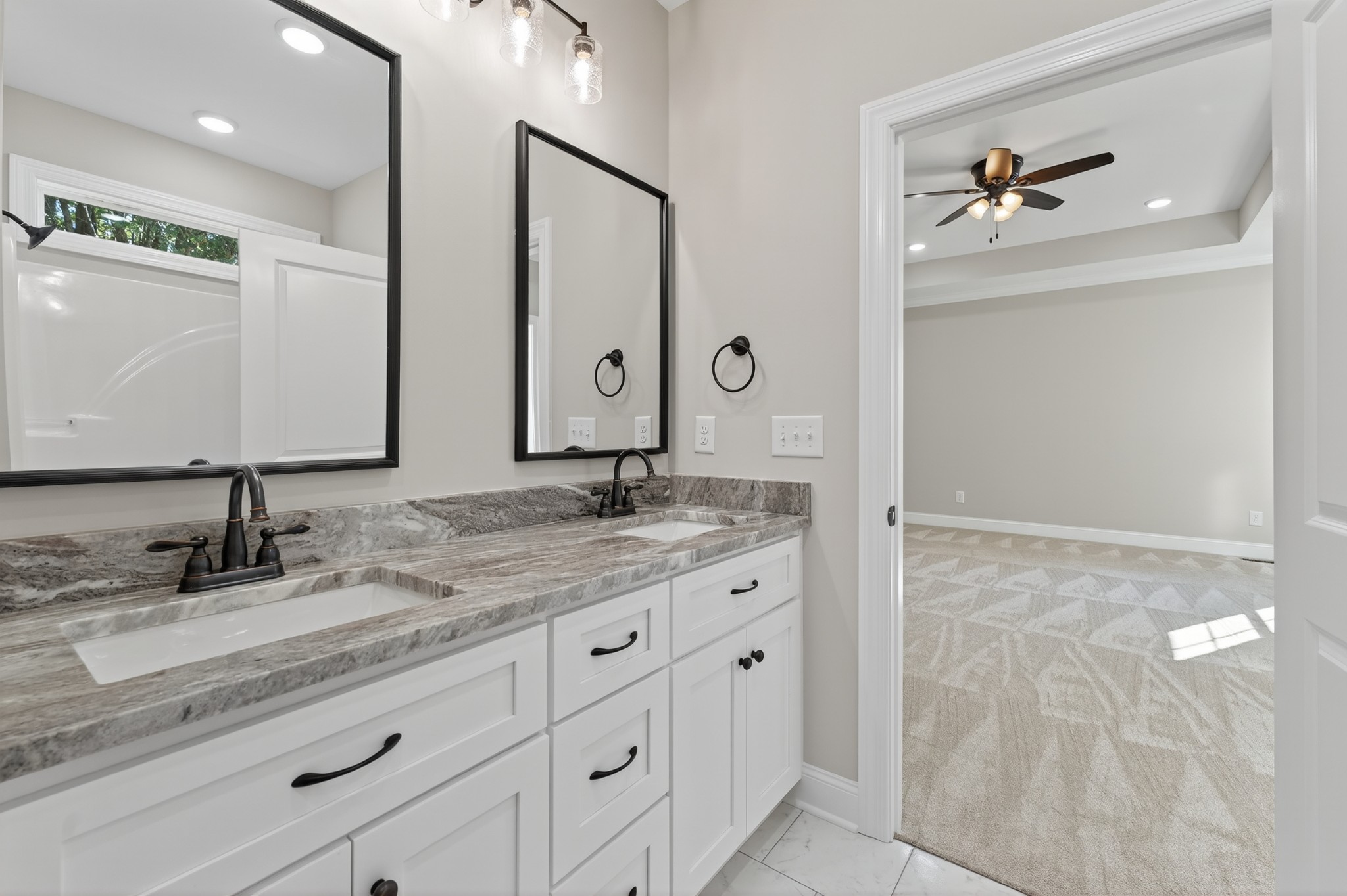 702 Meadow Road Mount Pleasant, TN 38474 - Photo 33 of 51 a bathroom with a granite countertop sink and a mirror