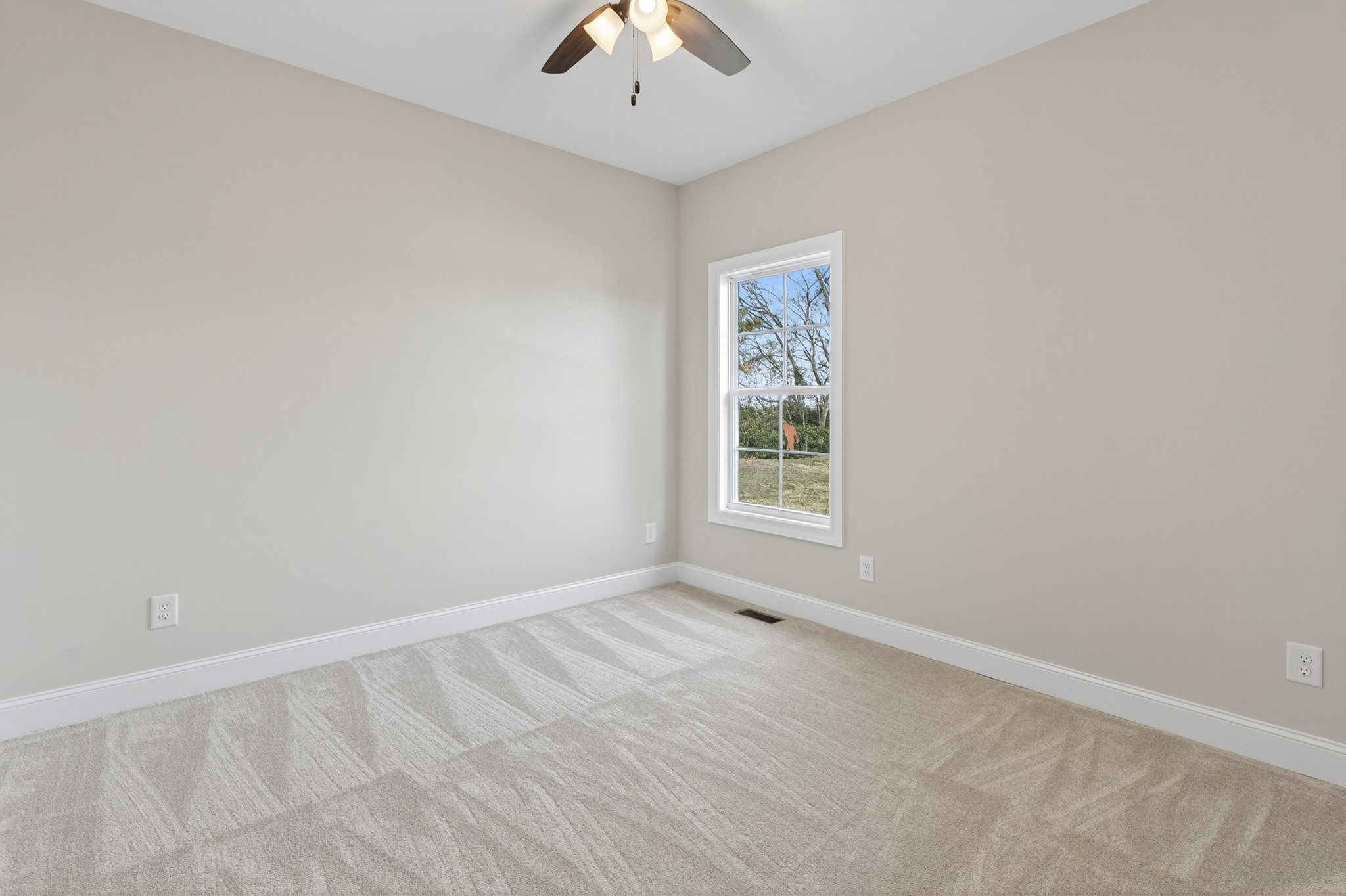 702 Meadow Road Mount Pleasant, TN 38474 - Photo 43 of 51 an empty room with a window