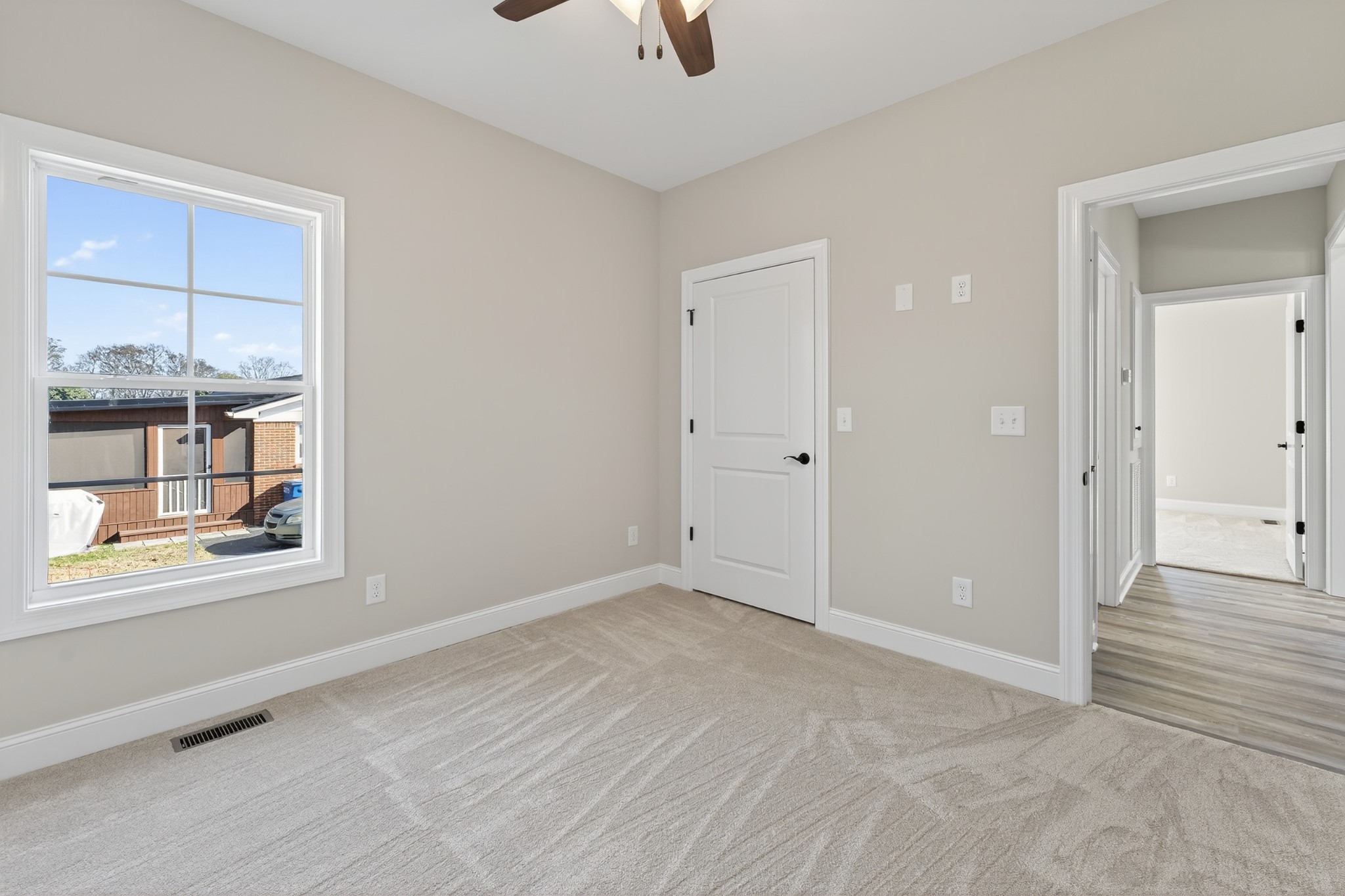 702 Meadow Road Mount Pleasant, TN 38474 - Photo 44 of 51 an empty room with windows and closet