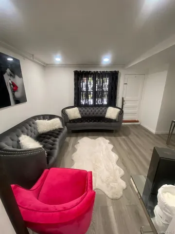 a living room with furniture and a couch