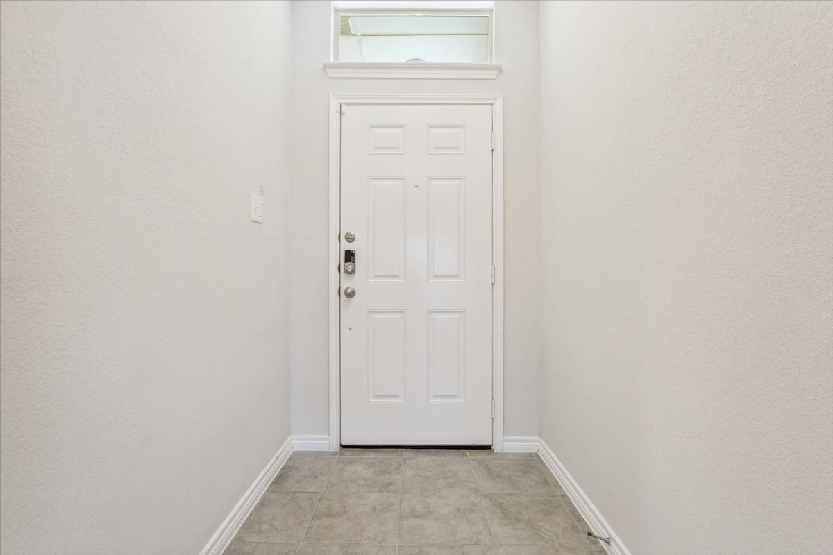 5830 Copano Road Belton, TX 76513 - Photo 8 of 34 Doorway to outside with baseboards