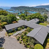 an aerial view of a house with a garden