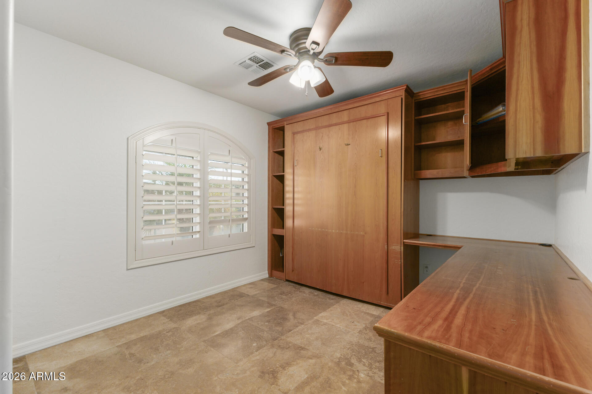 16426 South 29th Street Phoenix, AZ 85048 - Photo 19 of 21 an empty room with closet and windows