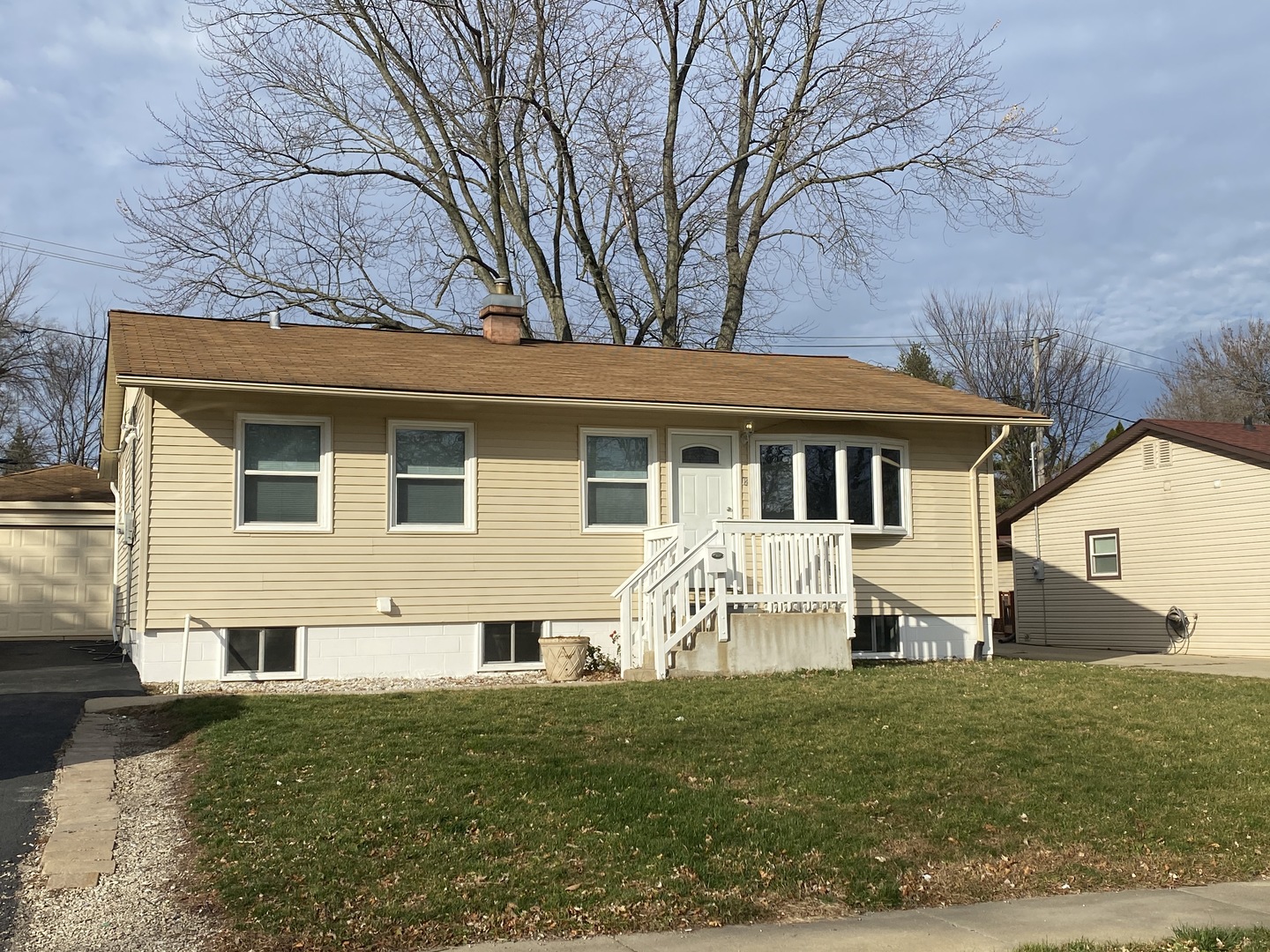 18 South Oltendorf Road Streamwood, IL 60107 - Photo 1 of 21 a view of a house with a yard