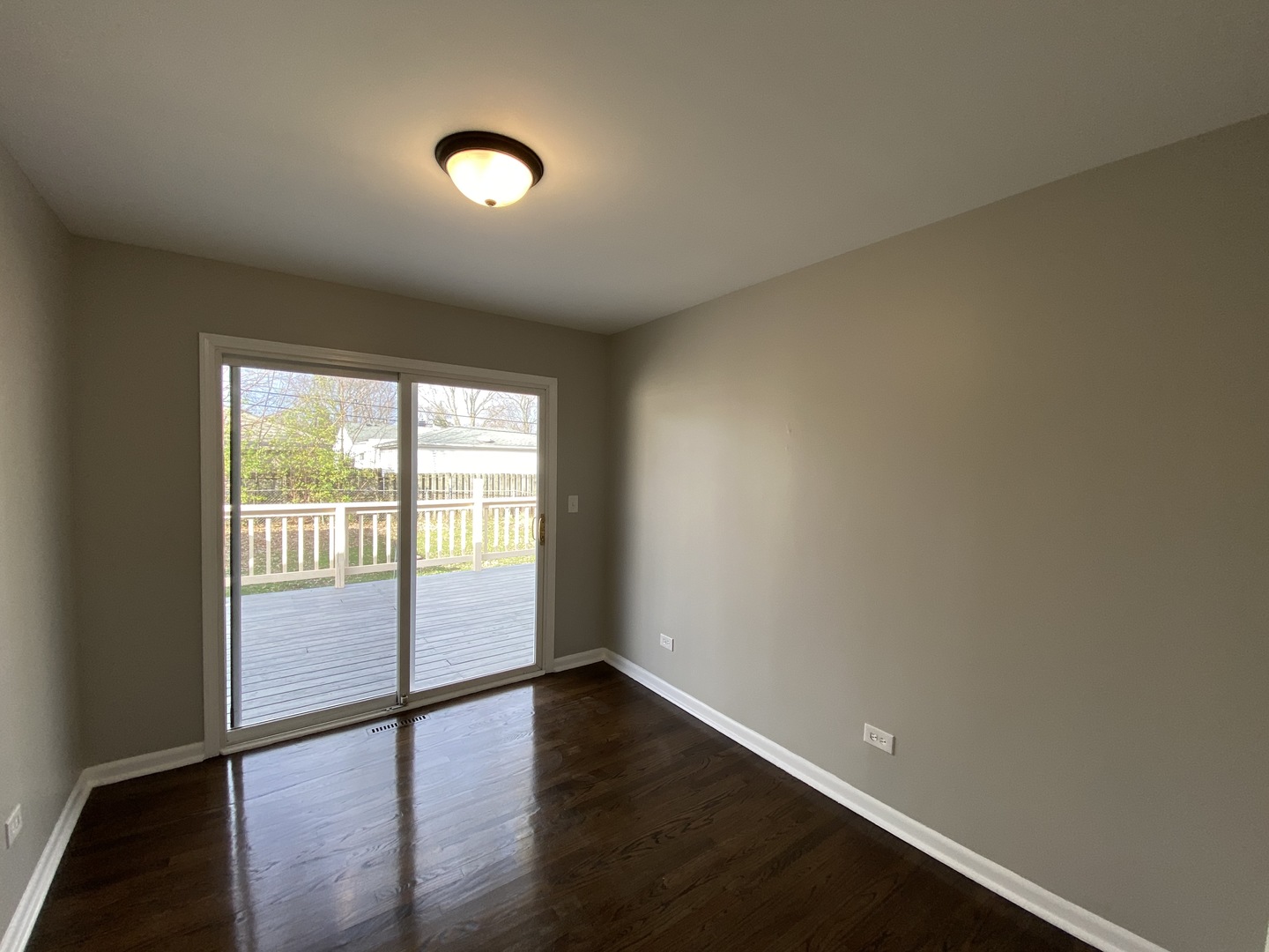 18 South Oltendorf Road Streamwood, IL 60107 - Photo 11 of 21 a view of an empty room with wooden floor and a window