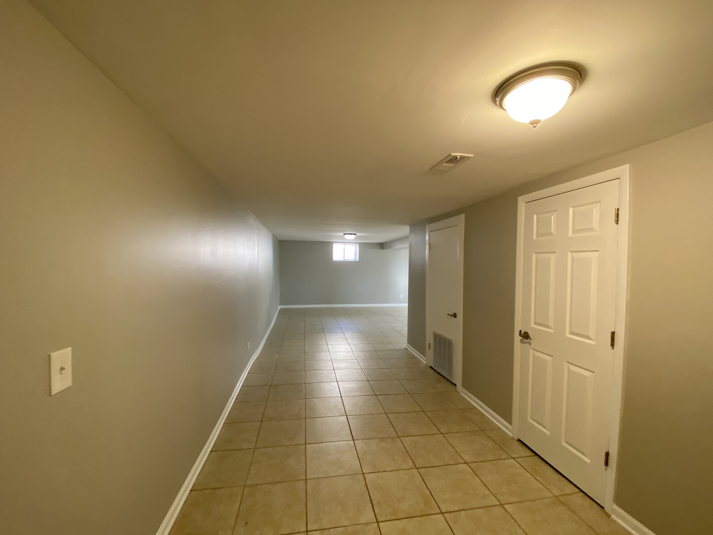 18 South Oltendorf Road Streamwood, IL 60107 - Photo 16 of 21 a view of a room with an empty space and a window