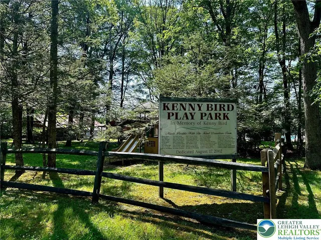 a view of swimming pool from a lake view