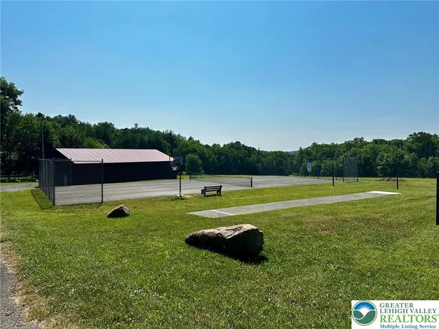 a view of a wrought iron fences in front of house