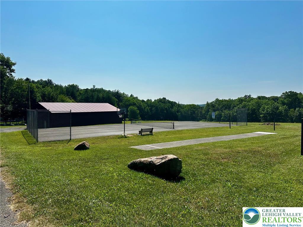 500 Sumac Court Kunkletown, PA 18058 - Photo 9 of 12 a swimming pool with wooden fence