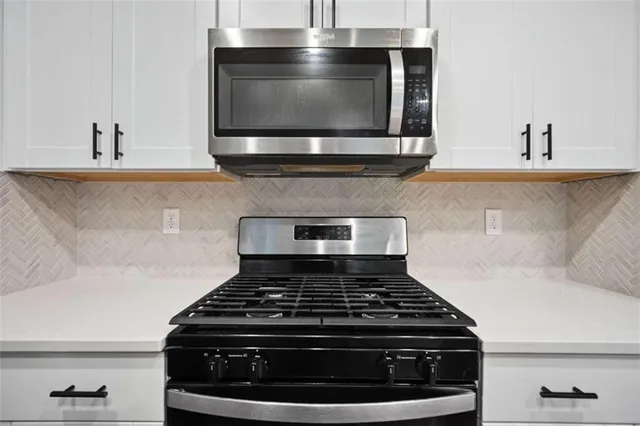 a view of pool and a window