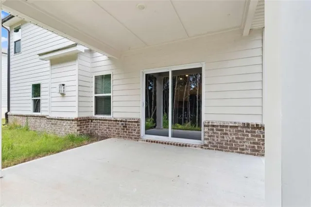 a view of a back yard from a room