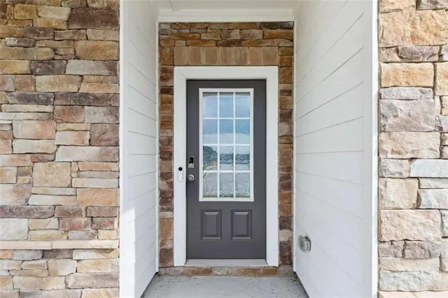 a front door view of a house with a outdoor space