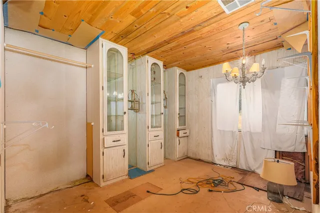 a view of a bathroom with a shower and sink