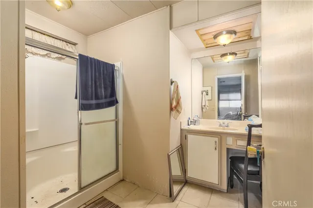 a bathroom with a sink and mirror