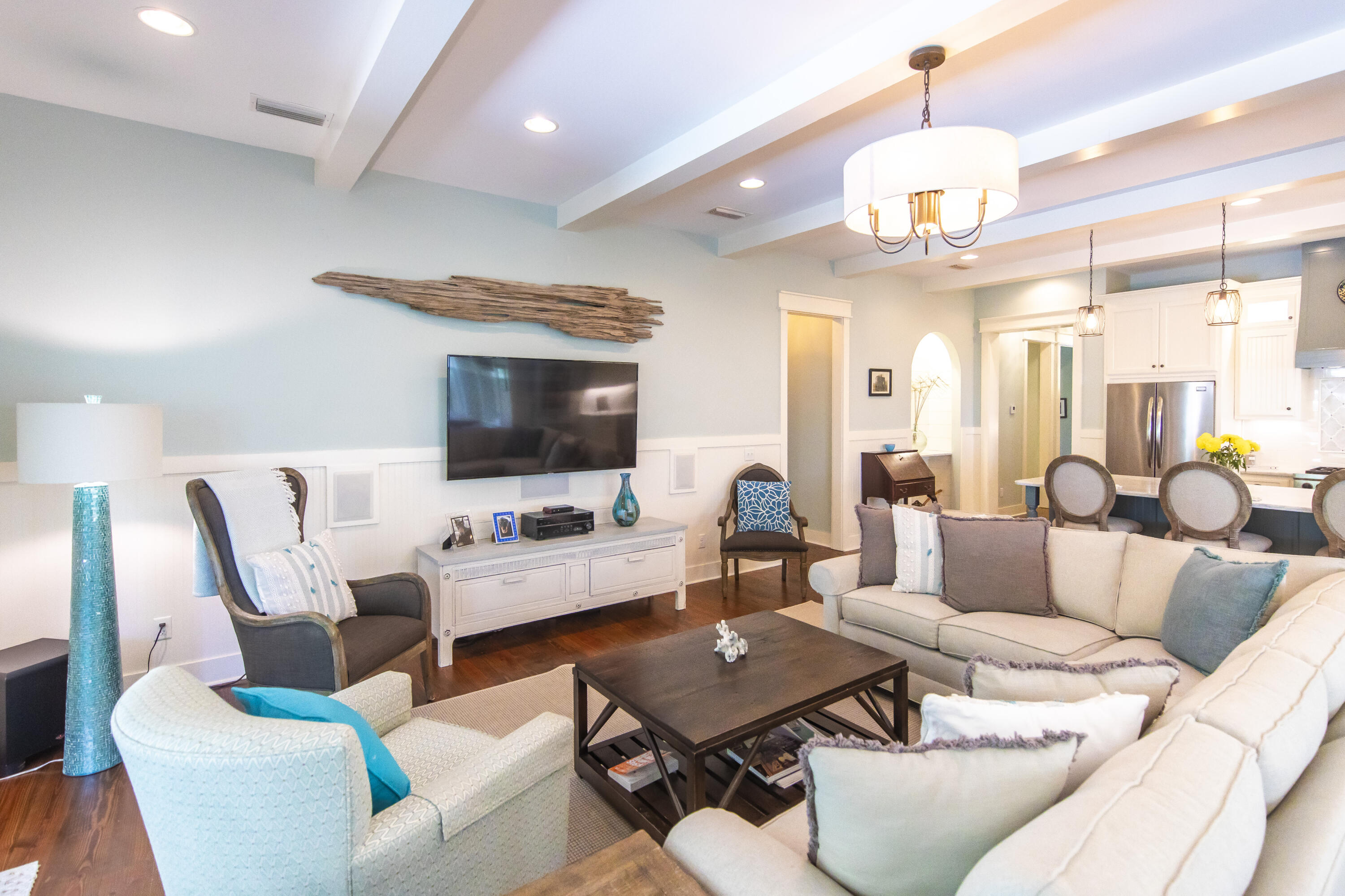 491 North Orange Street Inlet Beach, FL 32461 - Photo 13 of 65 a living room with furniture kitchen view and a chandelier