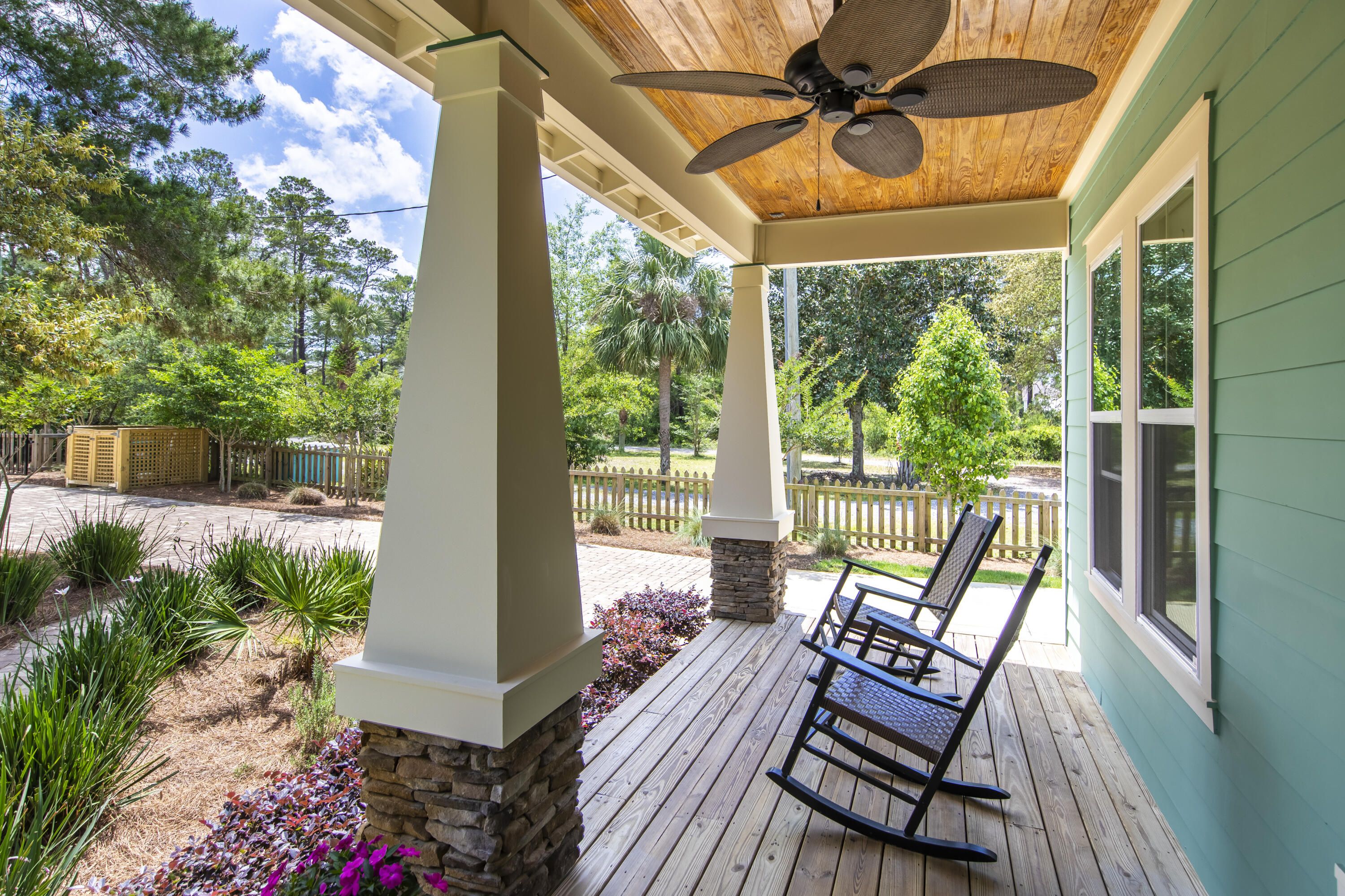 491 North Orange Street Inlet Beach, FL 32461 - Photo 28 of 65 a view of a porch with furniture and a yard