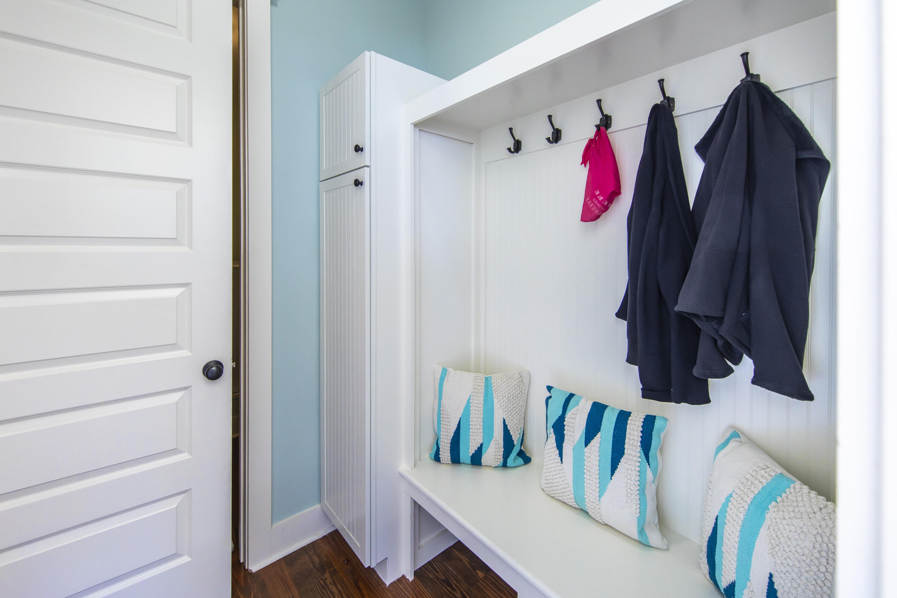 491 North Orange Street Inlet Beach, FL 32461 - Photo 50 of 65 a view of walk in closet with clothes and shoes