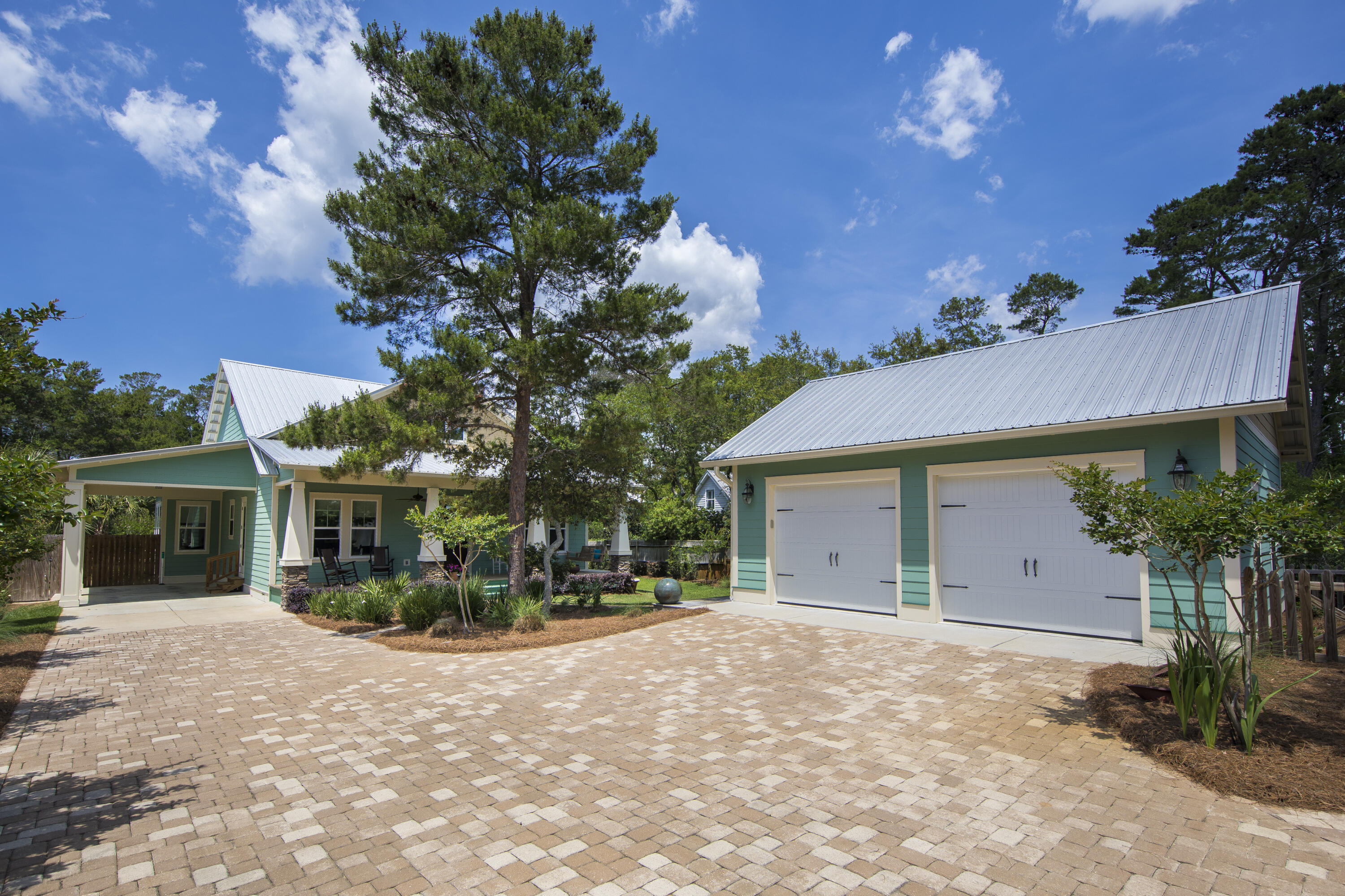 491 North Orange Street Inlet Beach, FL 32461 - Photo 5 of 65 a view of a house with a yard and potted plants