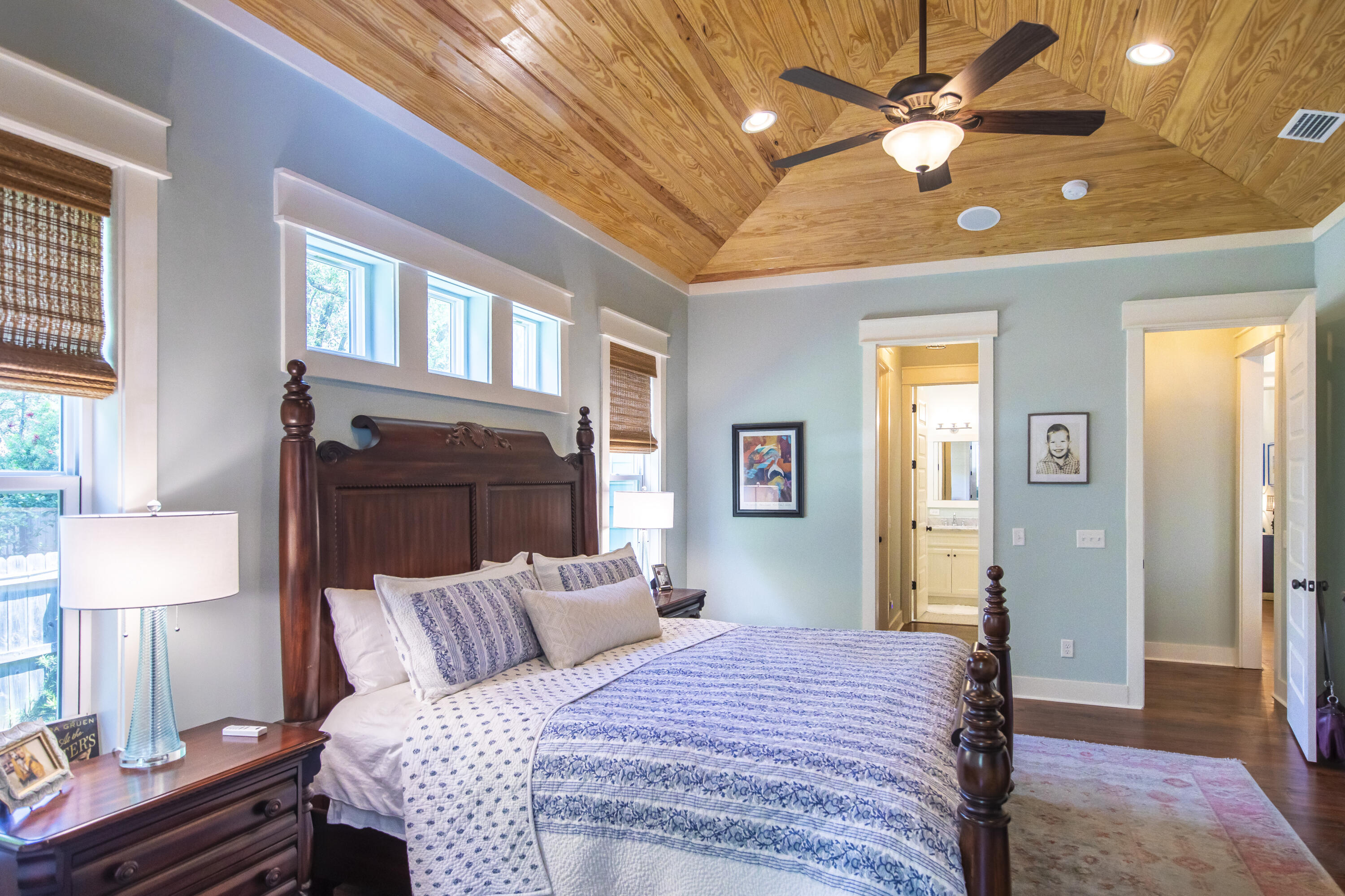 491 North Orange Street Inlet Beach, FL 32461 - Photo 54 of 65 a bedroom with a bed ceiling fan and a window