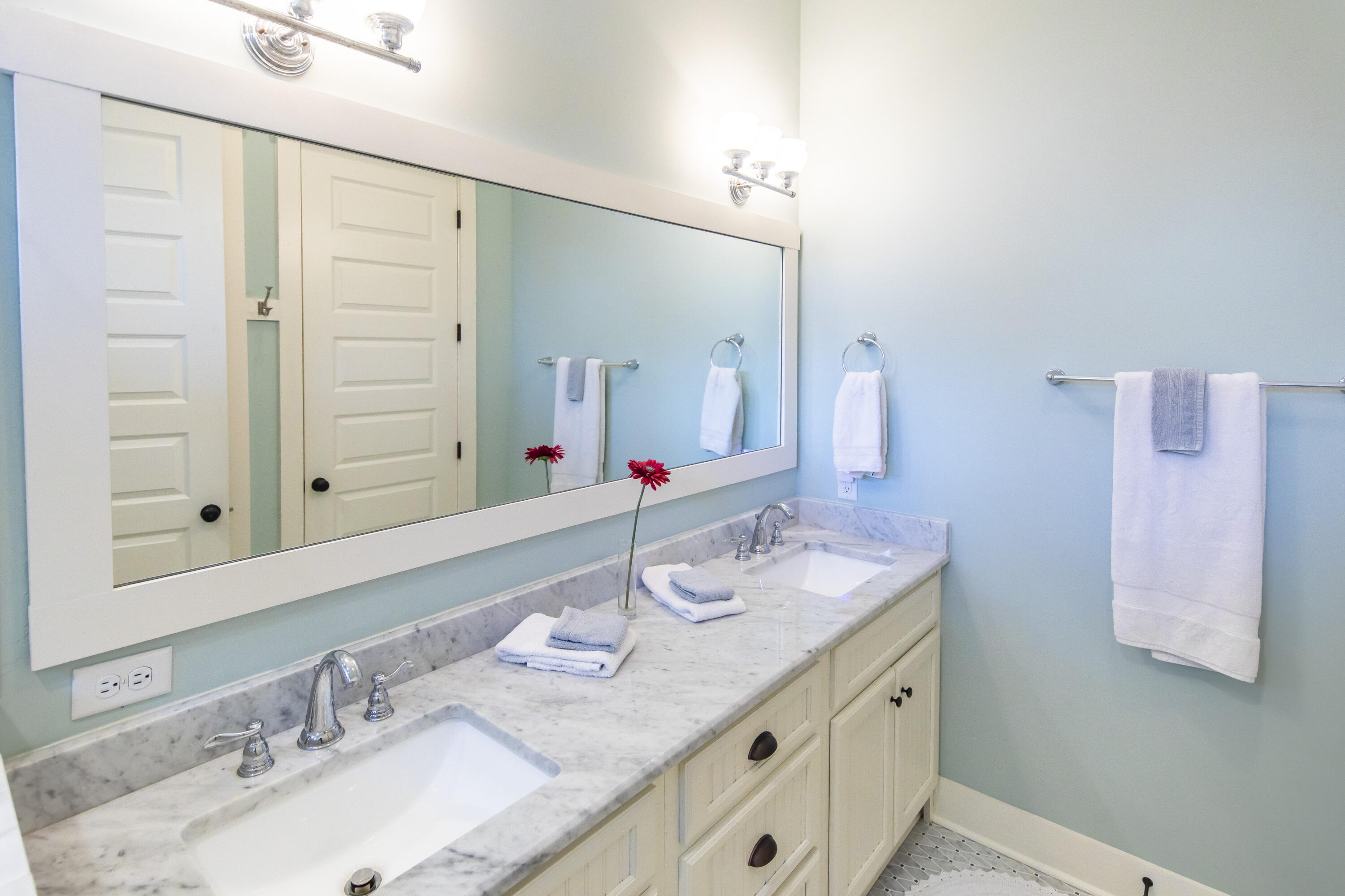 491 North Orange Street Inlet Beach, FL 32461 - Photo 55 of 65 a bathroom with a granite countertop sink and a mirror