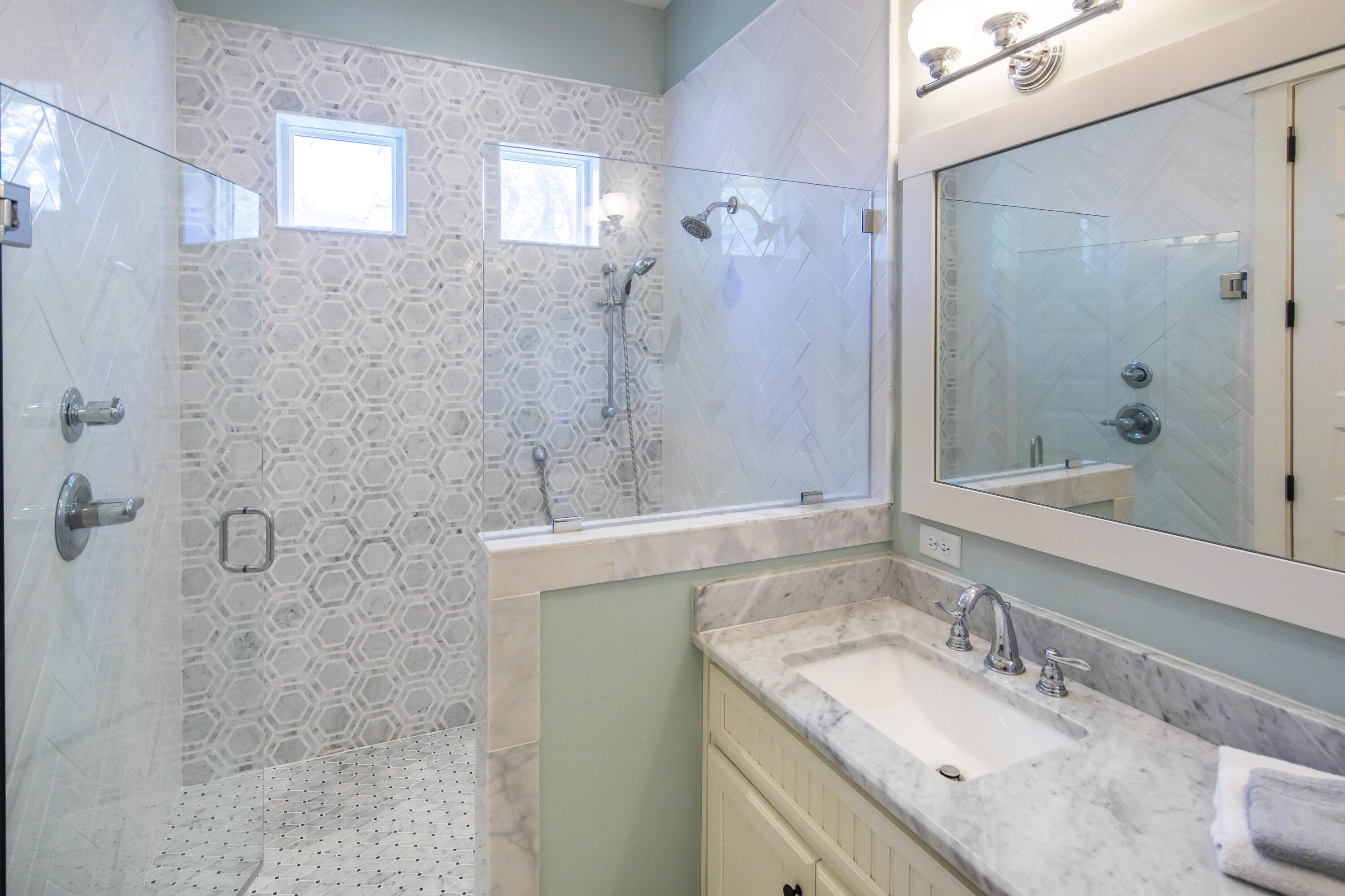 491 North Orange Street Inlet Beach, FL 32461 - Photo 56 of 65 a bathroom with a granite countertop shower sink and mirror