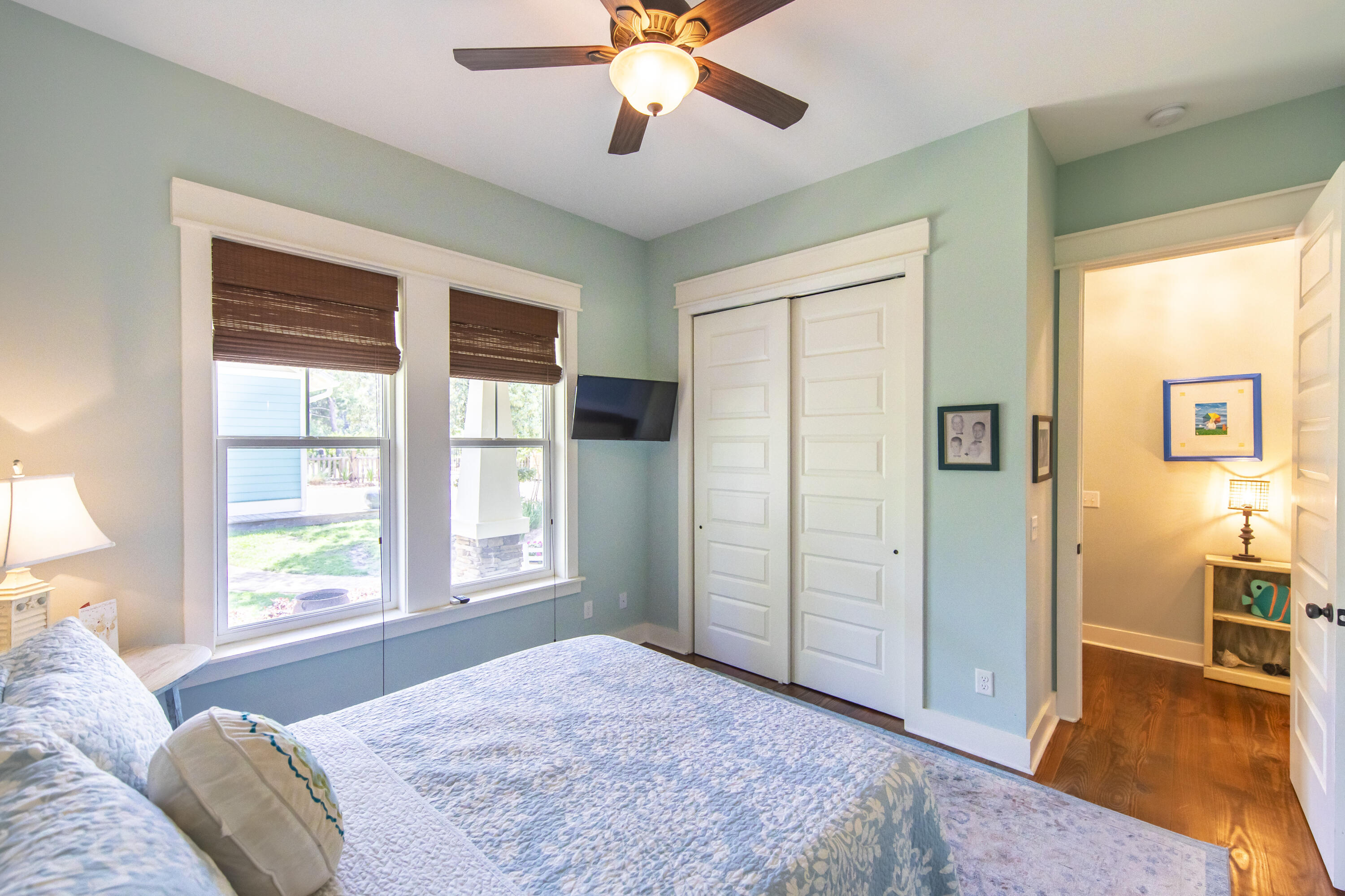 491 North Orange Street Inlet Beach, FL 32461 - Photo 58 of 65 a spacious bedroom with a large bed and a window