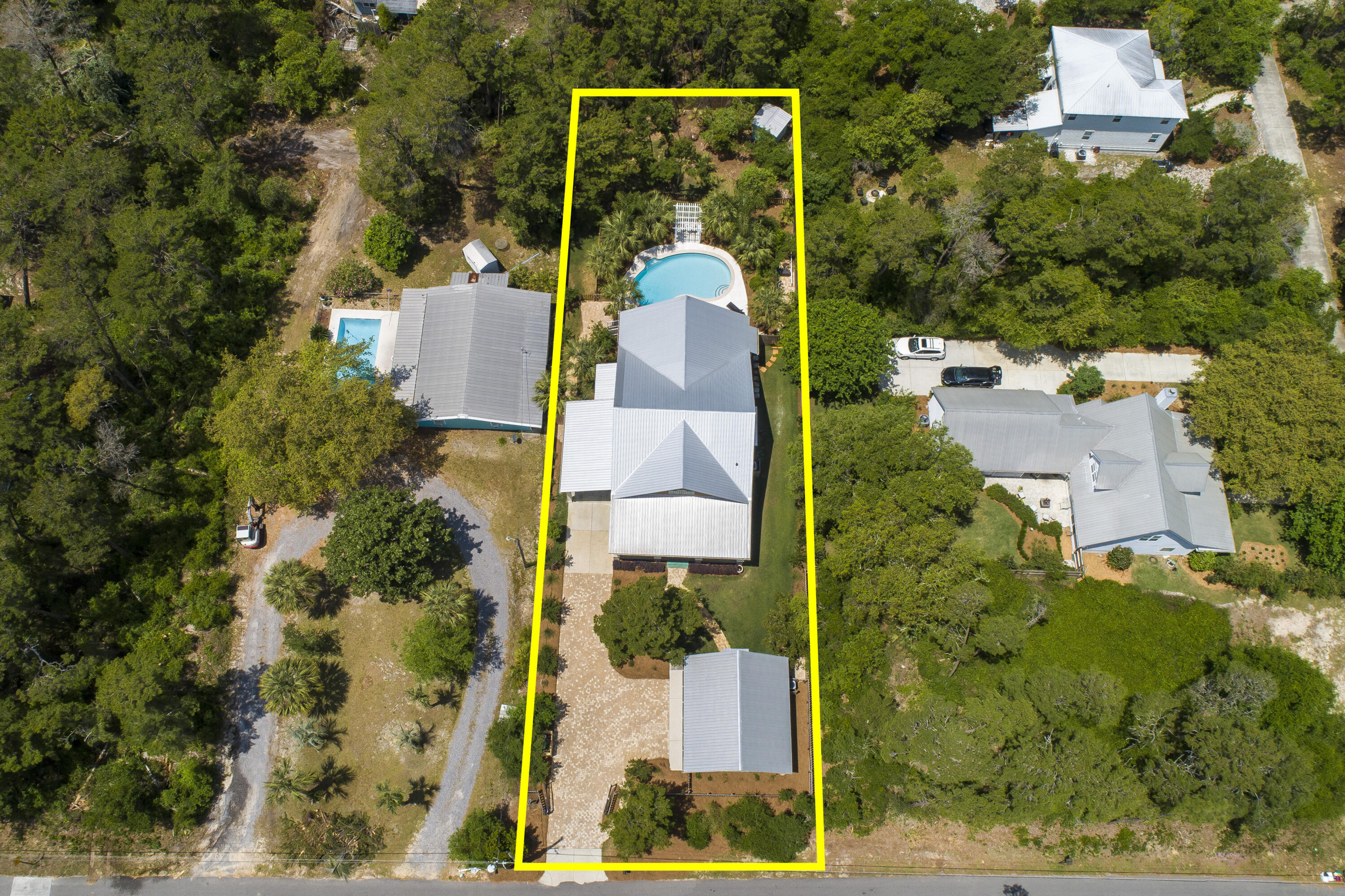 491 North Orange Street Inlet Beach, FL 32461 - Photo 6 of 65 an aerial view of a house with a yard and trees