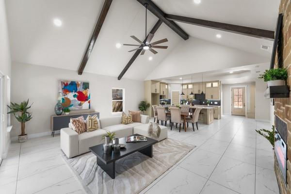 508 Luzon Street Tool, TX 75143 - Photo 13 of 40 a living room with furniture and a chandelier