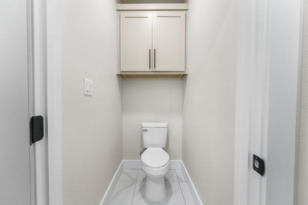 508 Luzon Street Tool, TX 75143 - Photo 25 of 40 a bathroom with a toilet