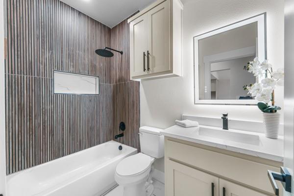 508 Luzon Street Tool, TX 75143 - Photo 27 of 40 a bathroom with a sink a toilet and shower